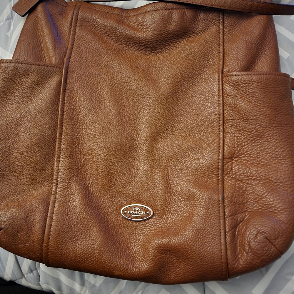 Ladies, Coach, crossbody bag. Butter, tan  leather...Crossbody or shoulder bag